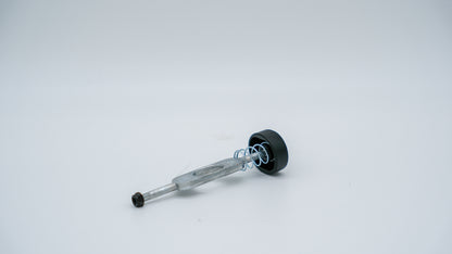 Seitenansicht der Hinterradverriegelung von ABC-Design, leicht geneigt, auf weißem Hintergrund.